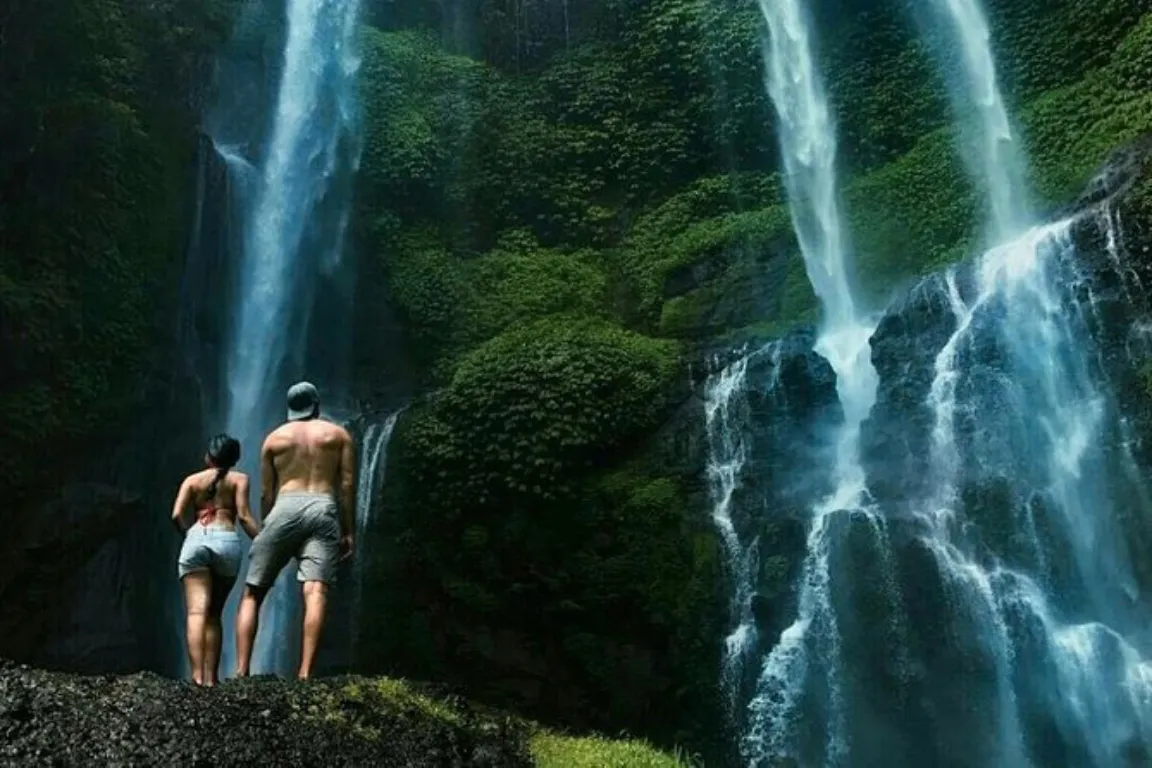 Waterfall trekking scene Bali adventure wellness
